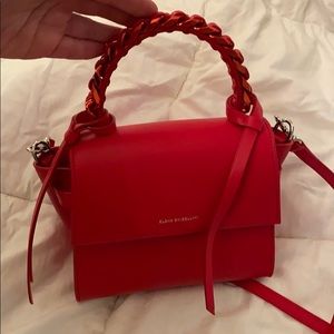 Elena Ghisellini red purse